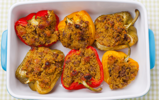 Stuffed bell peppers in a baking dish
